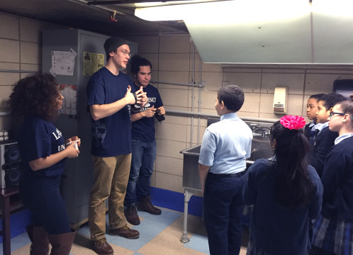 KidsGive members work with children at St. Veronica Elementary School.