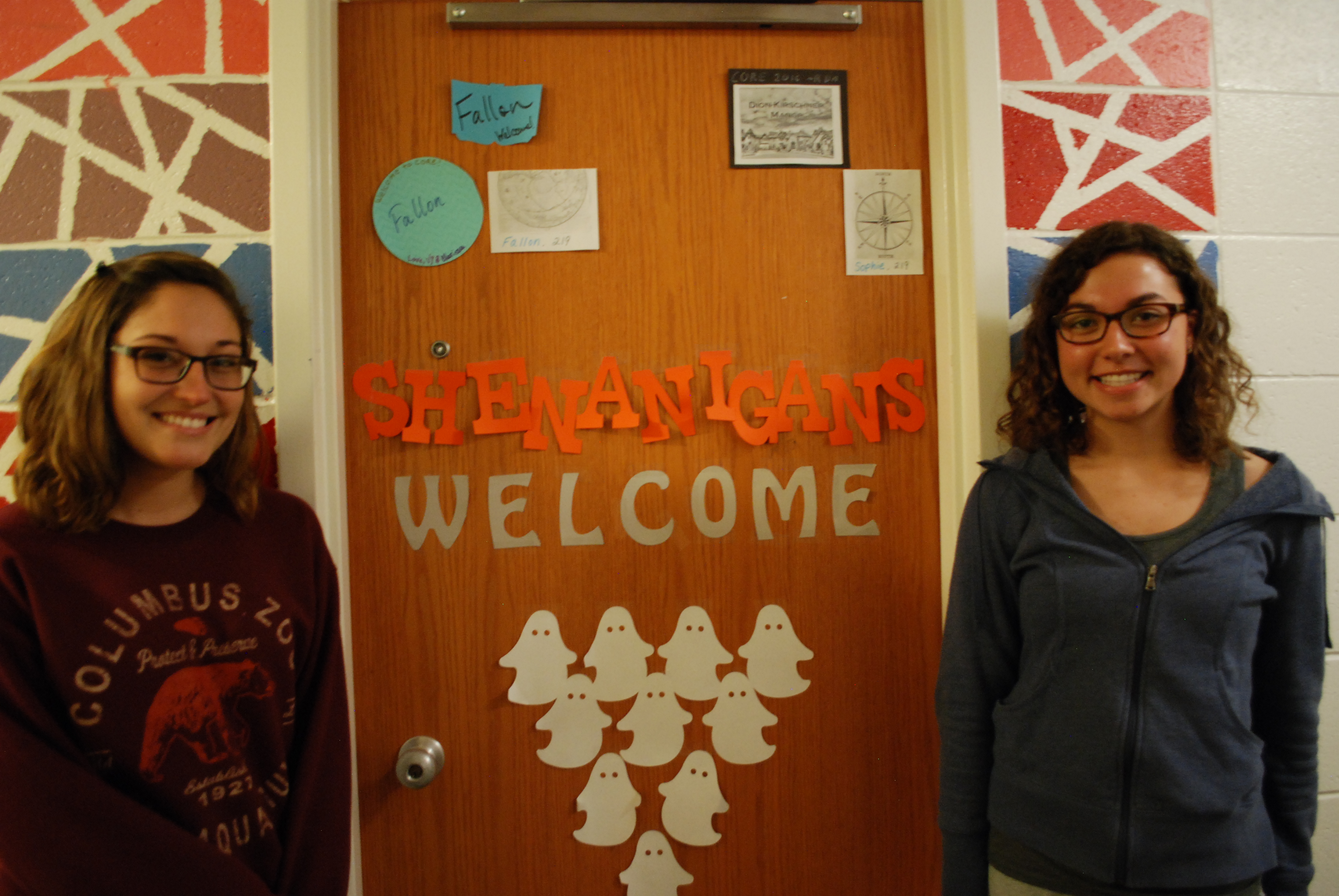 Fallon Sellers and Sophia Dion-Kirschner outside of their room. 